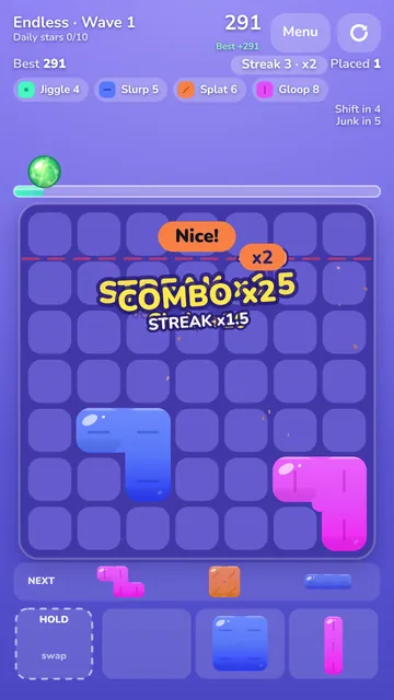 Gelominos gameplay: a chain of popped pieces with a combo banner